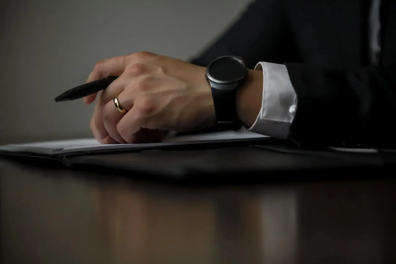 Attorneys in discussion at a conference table