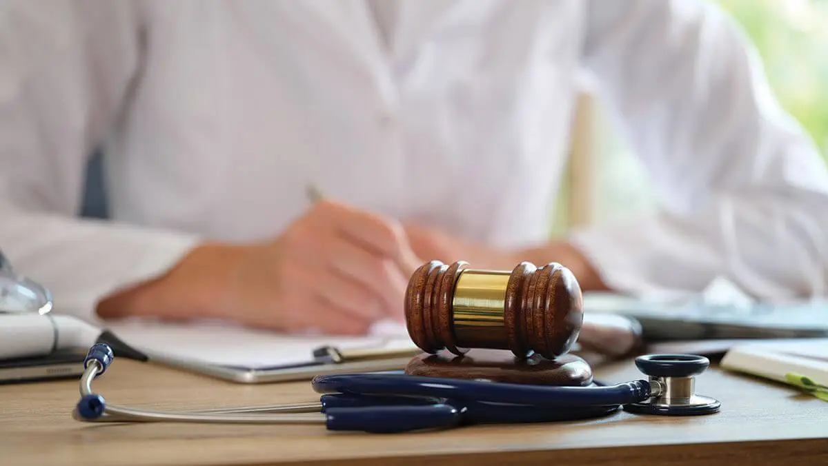 Protective equipment and documents on a desk
